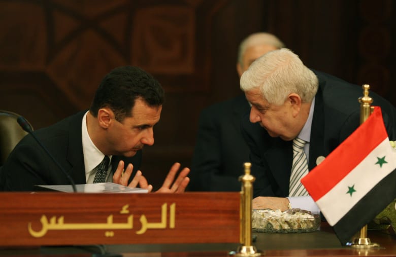 صورة أرشيفية لوليد المعلم مع بشار الأسد